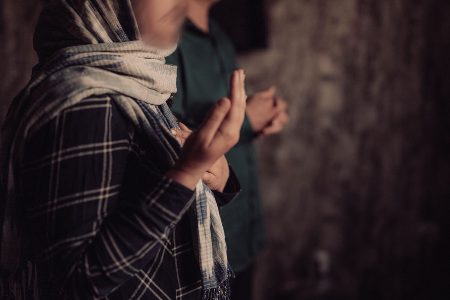 Ariana and her husband praying
