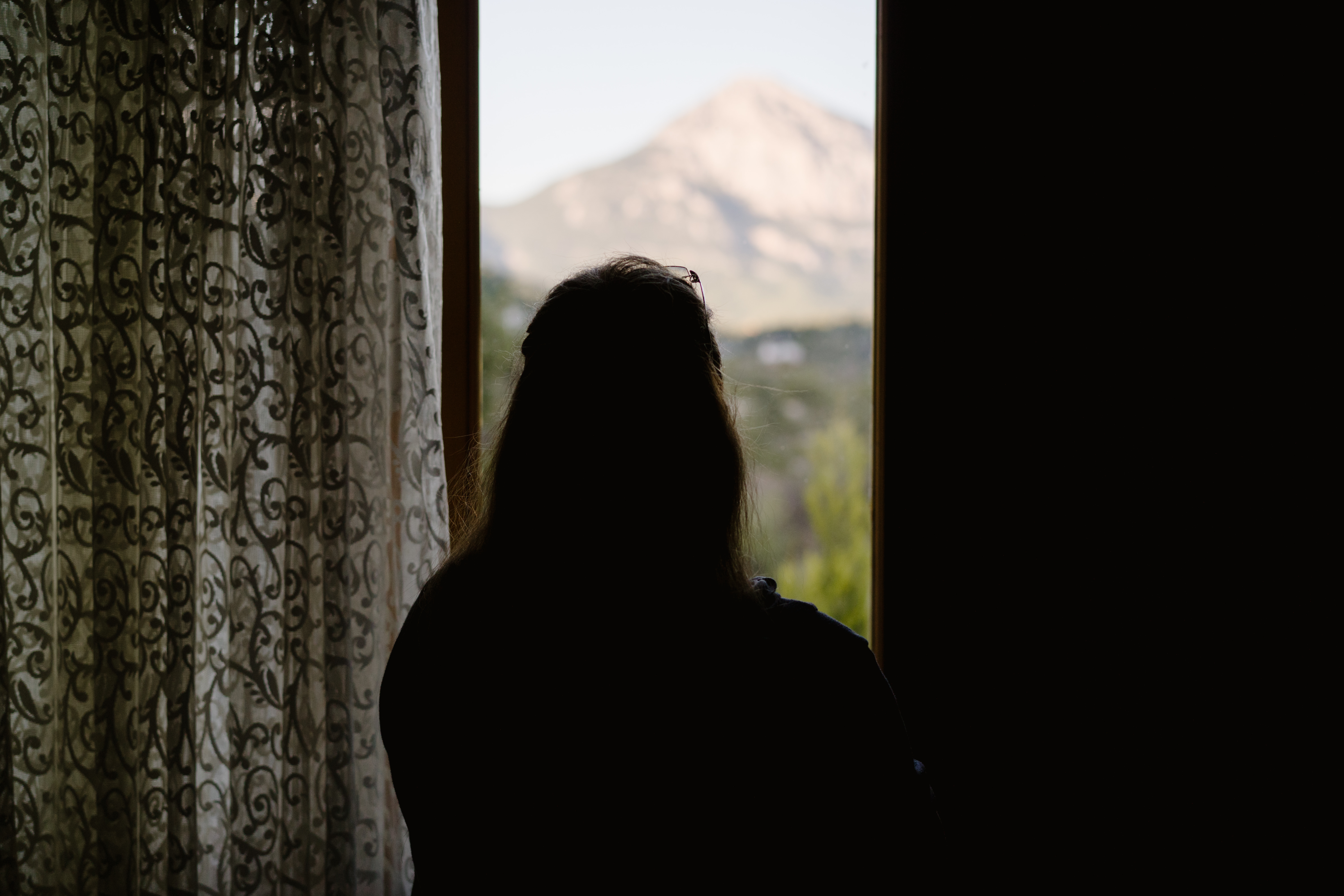 Somayeh looking out a window