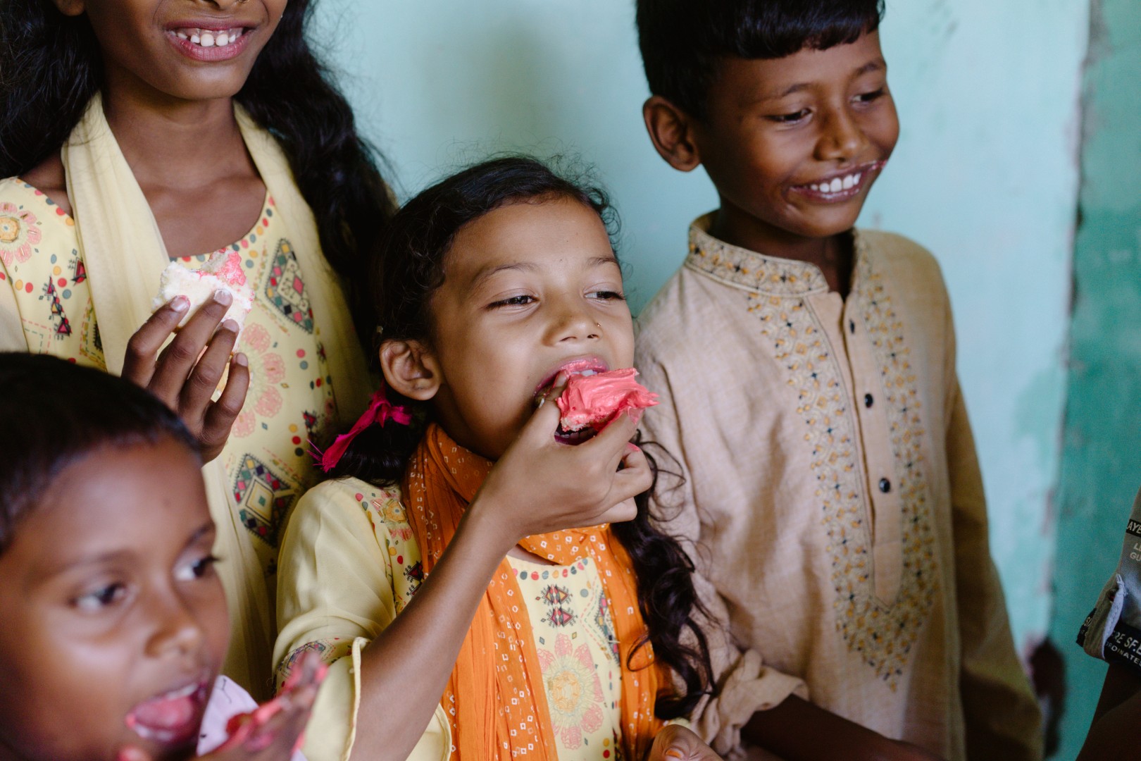 Children eating cake at Christmas